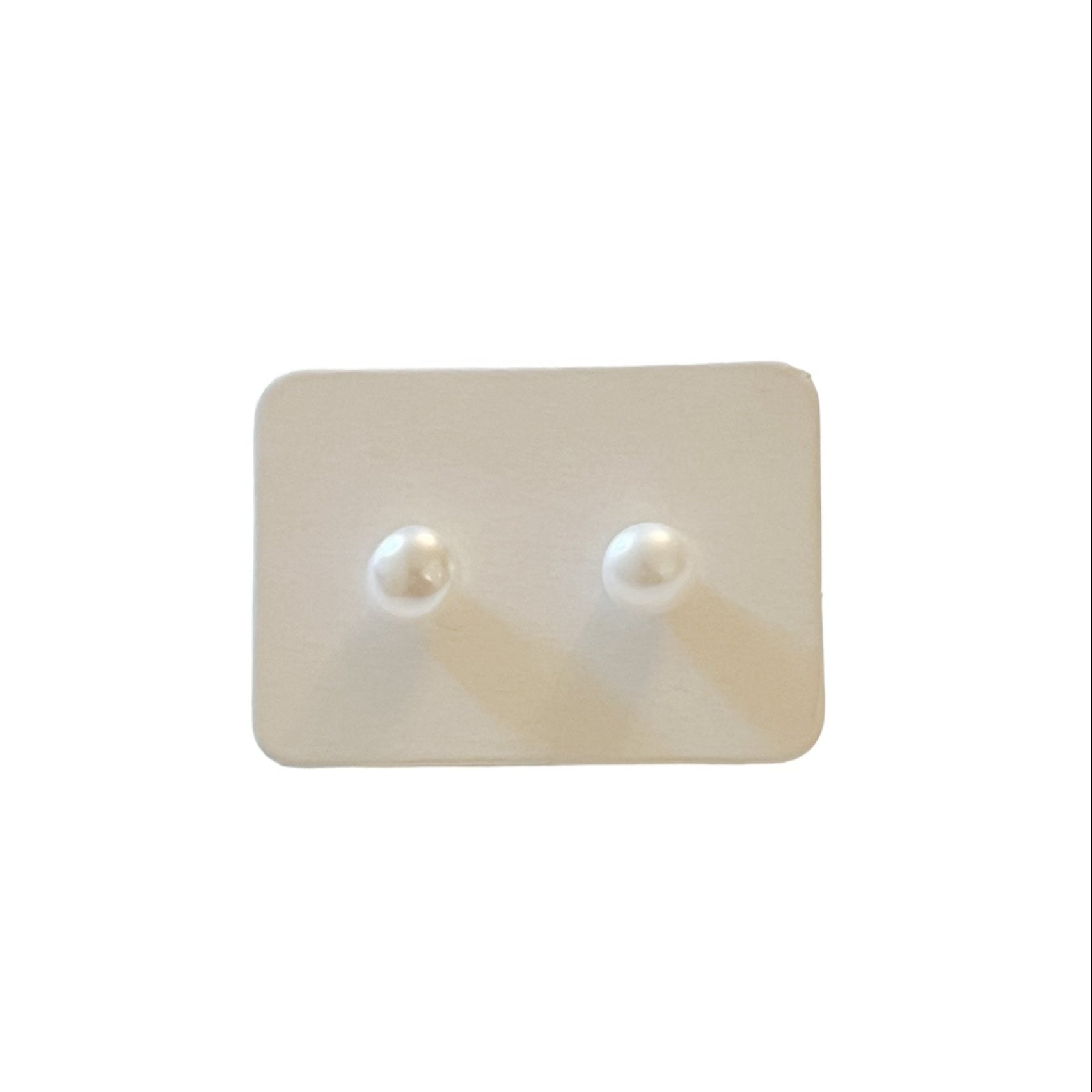 white dainty pearl stud earrings