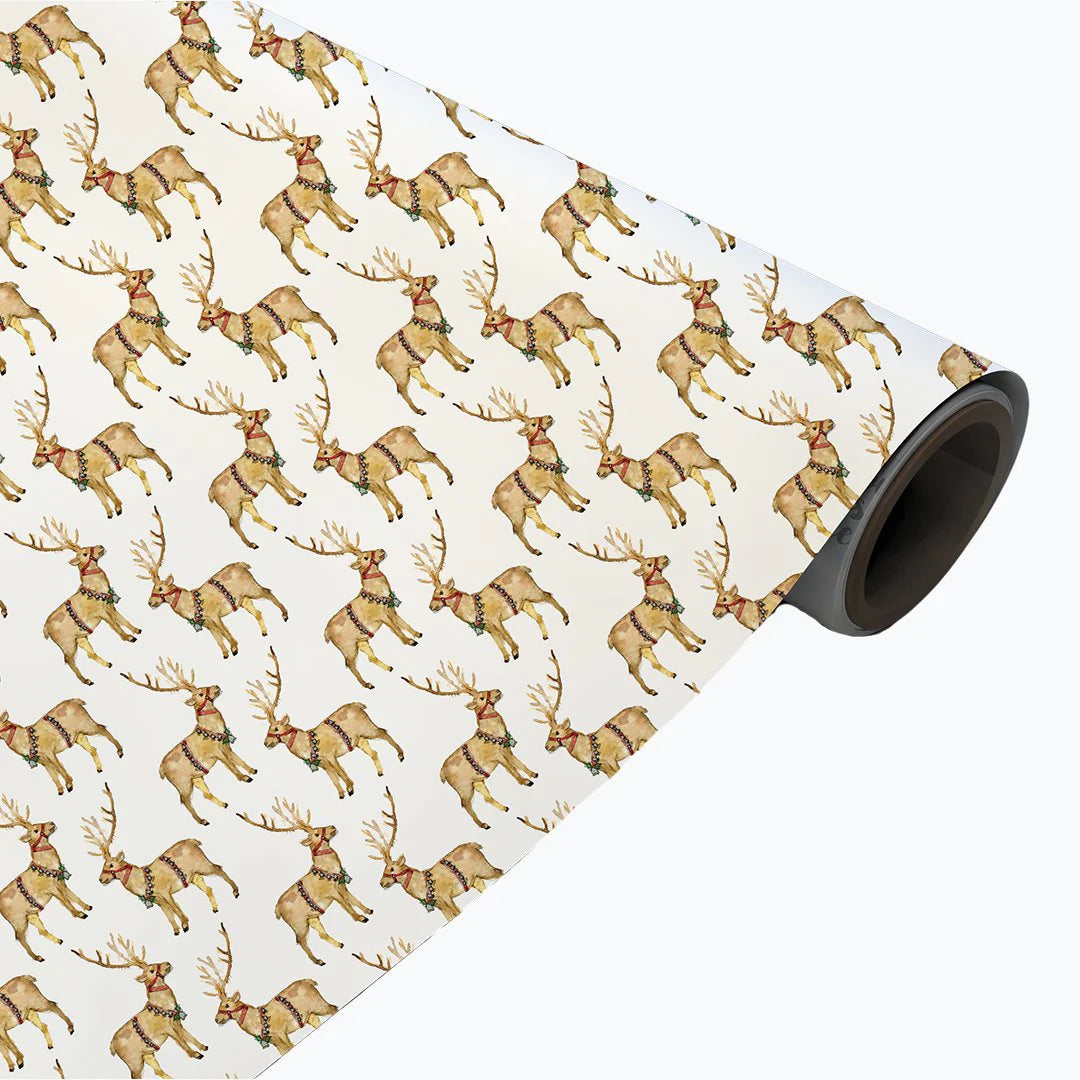 Roll of wrapping paper with reindeer pattern on a white background