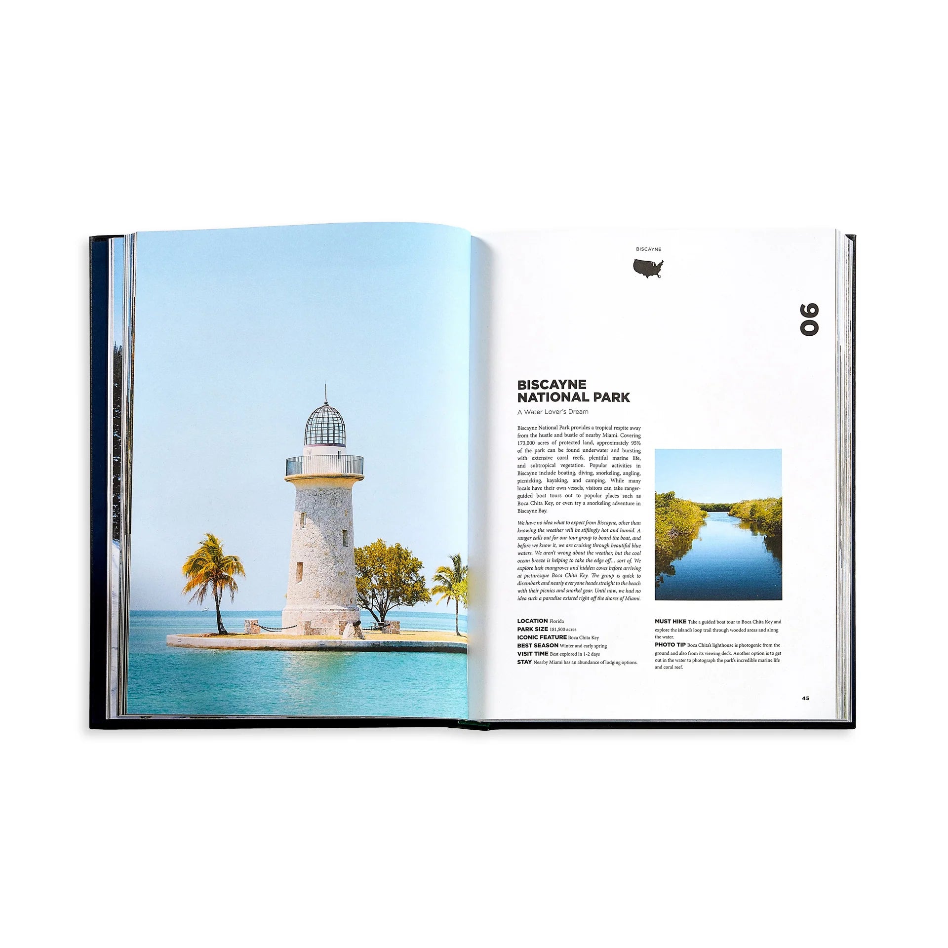 open book view of lighthouse photo and text about Biscayne National Park from hardcover book "Roaming America" on white background