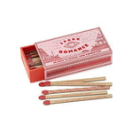 Matchbox with romantic-themed matches on a white background