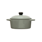 blue ceramic cooking pot with a lid on a white background