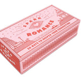 Pink box of matches with 'Spark Romance' text on a white background