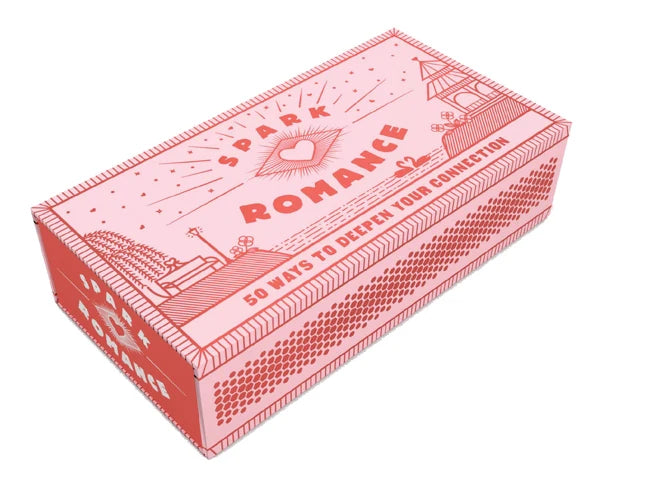 Pink box of matches with 'Spark Romance' text on a white background