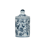 White ceramic jar with blue floral patterns on a white background