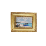 Framed art magnet of a coastal scene with boats on a white background