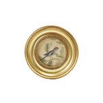 Decorative art magnet with a gold frame and a bird illustration on a white background