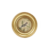 Decorative art magnet with a gold frame and a bird illustration on a white background