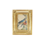 Decorative gold framed art magnet with a small painting of a bird on a white background