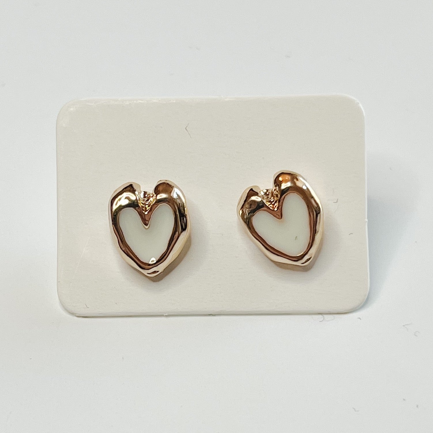 white and gold heart stud earrings