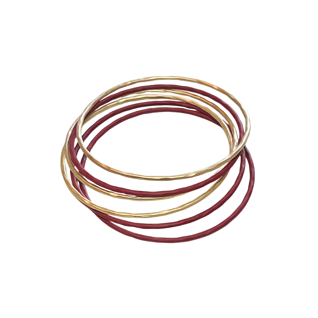 bangle stack bracelet, three gold and three wine colored bangles