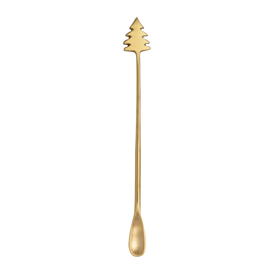 Gold Christmas tree-shaped spoon on a white background