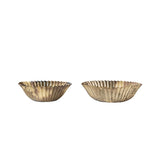 Two gold decorative bowls on a white background