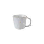 White ceramic mug with gold rim and handle on a white background