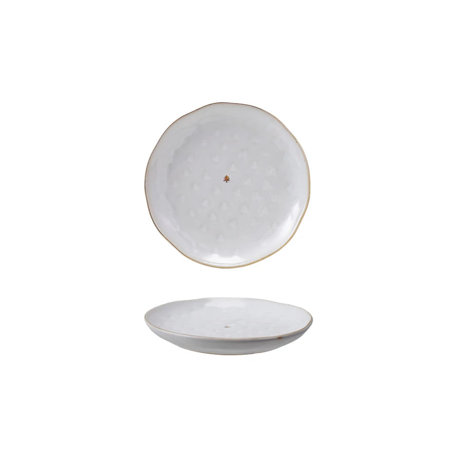 Set of ceramic plates with christmas tree design on a white background