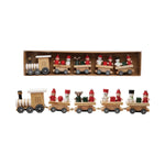 Wooden toy train set with Christmas-themed figures in a box on a white background