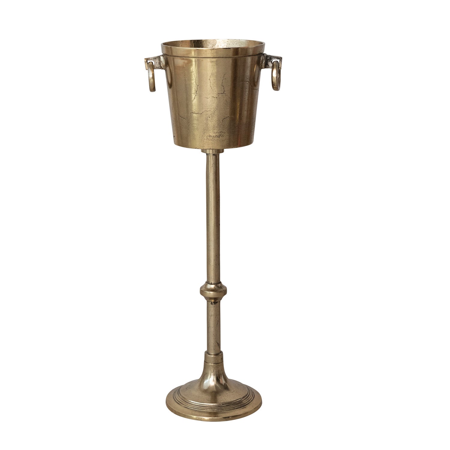 Brass wine cooler on a stand with a white background