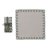 Set of folded fabric with decorative edge and a matching roll on a white background