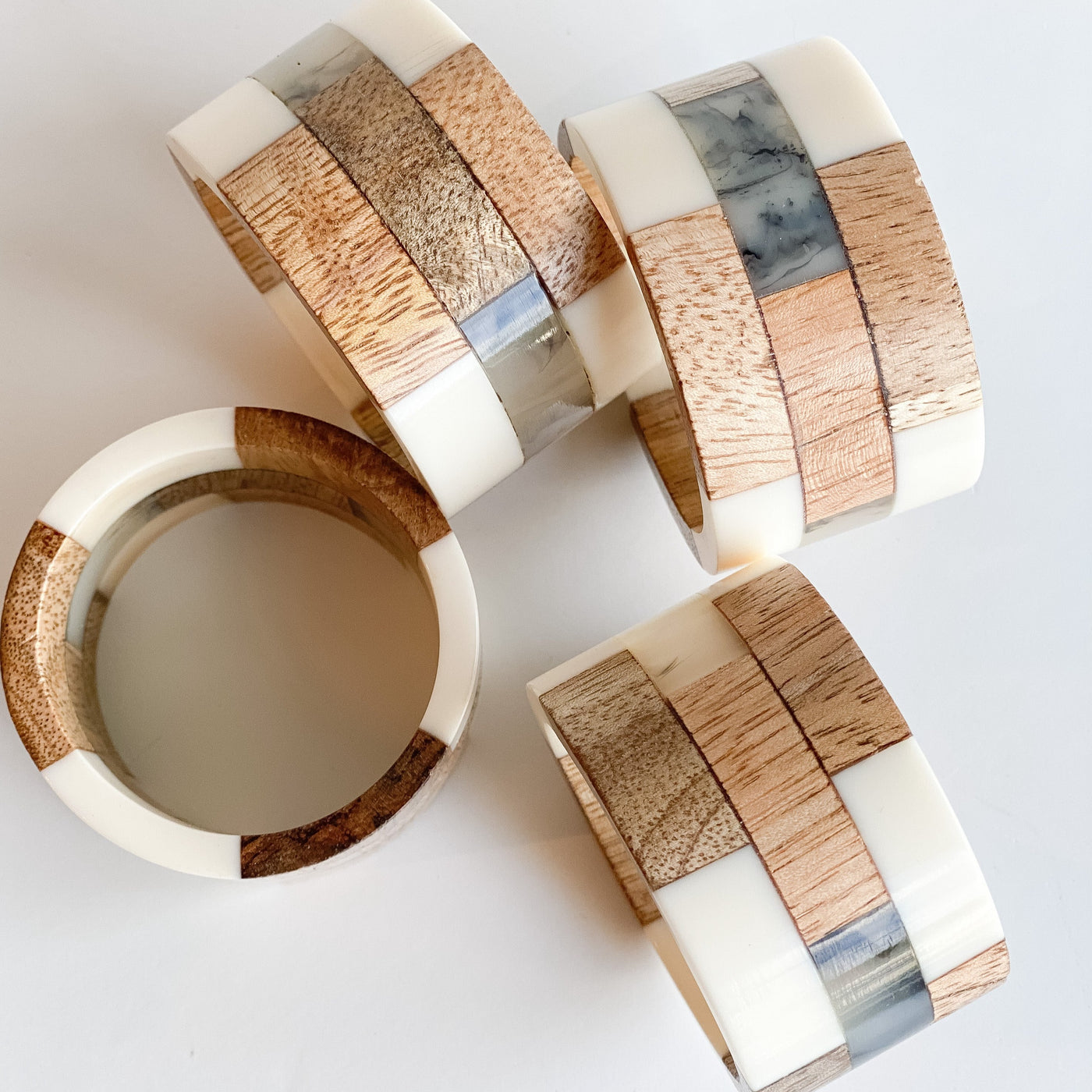 Mango Wood Napkin Rings - Set of Four - Danshire Market and Design , natural elements to your dining table with these circular Mango Wooden Segments + Resin Napkin Rings. 