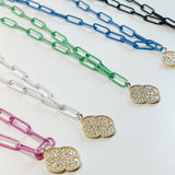 colorful chain link necklace with a gold clover charm.   Available in Five Colors: Black, Blue, Green, Pink, and White  Dimensions: 17" Chain with a .5" Extender and  1" Clover Charm