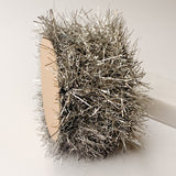 silver fringe tinsel garland on spool