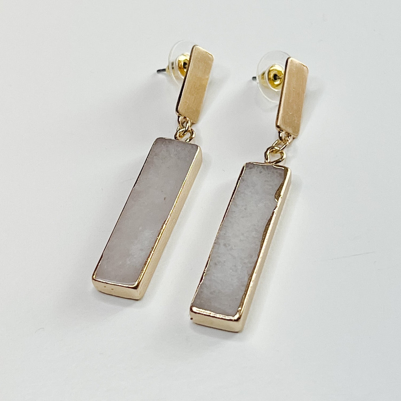 gold trim rectangle dangle with crystal colored stone 