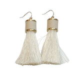 tassel earrings, leather caps, coordinating wrap, gold details, ivory coloring