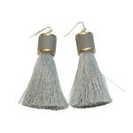 tassel earrings, leather caps, coordinating wrap, gold details, blue/gray color