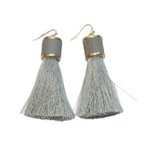 tassel earrings, leather caps, coordinating wrap, gold details, blue/gray color