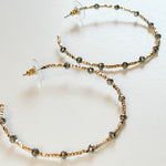 open hoops with Hematite and gold beads. 